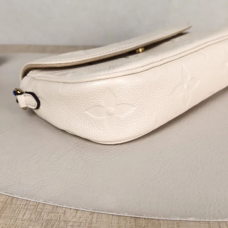 Louis Vuitton Crossbody Bag IVY White Monogram Empreinte Embossed Calfskin Small 23.5 × 4.3 × 12 cm — detail view 6 of 11