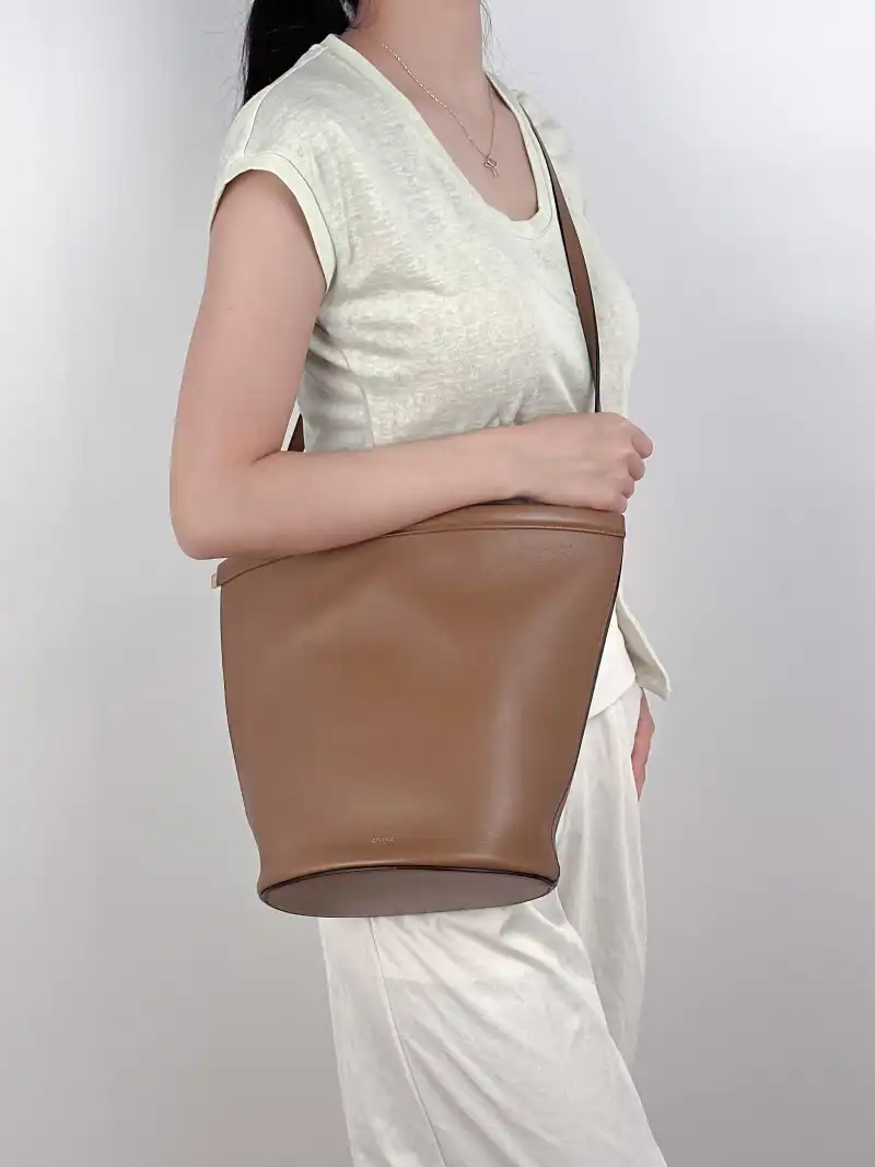 CELINE Crossbody Bag Clasp Bucket Bucket Bag Brown Calfskin One Size20 × 13.5 × 26 cm — on-model view 2 of 3