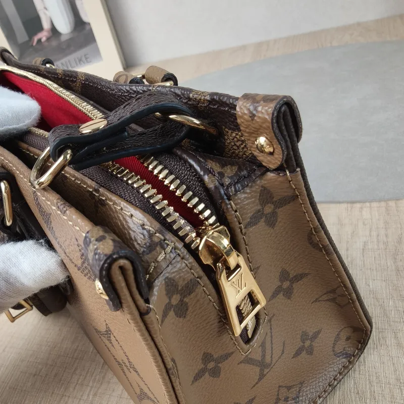 Louis Vuitton Crossbody Bag Onthego East West Monogram PVC Small 25 × 10 × 13 cm — detail view 15 of 16