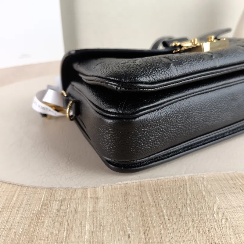 Louis Vuitton Crossbody Bag Pochette Métis East West Black Empreinte Embossed Calfskin Small 21.5 × 6 × 13.5 cm — detail view 1 of 15