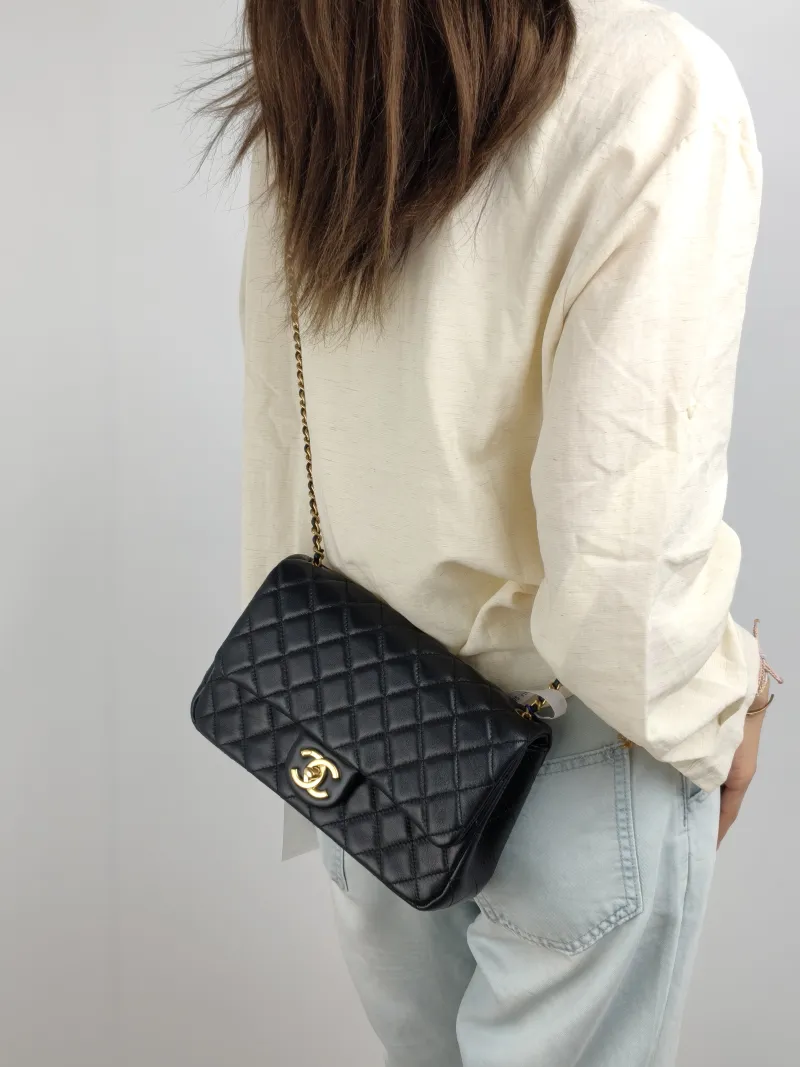 Chanel Shoulder Bag c cf Black Lambskin One Size 24 × 7 × 14.5 cm — on-model view 2 of 2