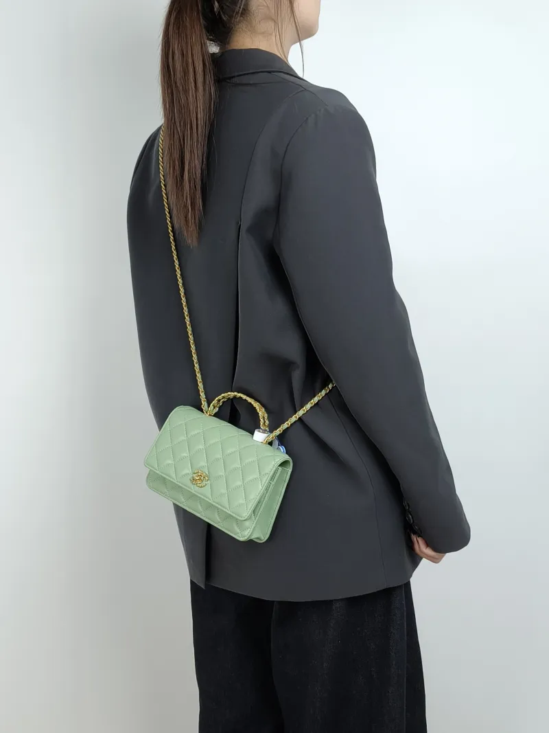 Chanel Crossbody Bag Edition woc Green Lambskin Mini 19.2 × 3.5 × 12.3 cm — on-model view 2 of 3