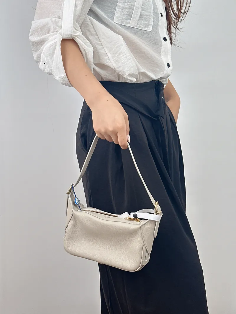 CELINE Shoulder Bag Romy Hobo Shoulder Bag White Calfskin Mini 19 × 5 × 14 cm — on-model view 2 of 2