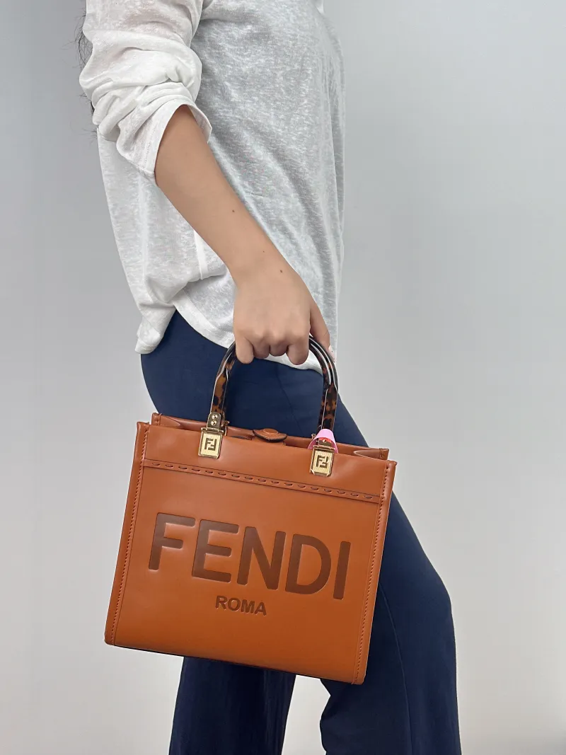 FENDI Crossbody Bag Sunshine Shopping Tote Caramel Calfskin Small 25.5 × 12 × 22.5 cm — on-model view 1 of 2
