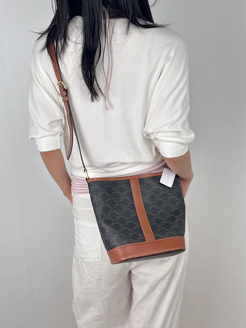 CELINE Crossbody Bag Triomphe Bucket Bag Monogram PVC Small22 × 13 × 26 cm — on-model view 2 of 2