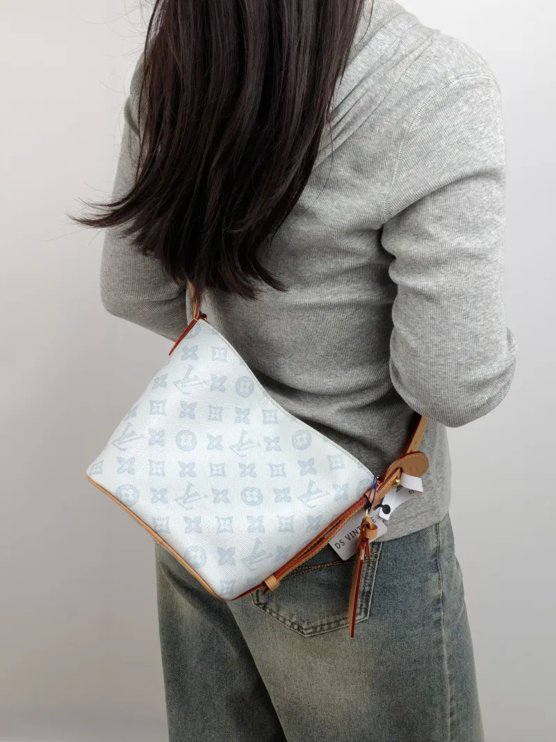Louis Vuitton Top Handle Bag ALL IN BB Blue PVC BB 16 × 12 × 18 cm — on-model view 3 of 3