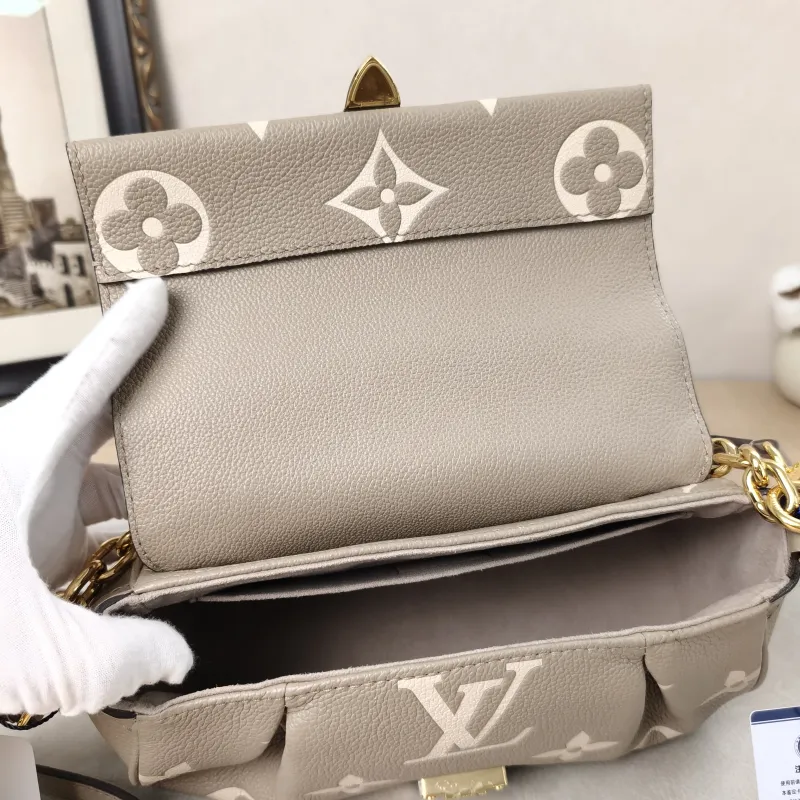 Louis Vuitton Crossbody Bag Favorite Empreinte Embossed Calfskin Monogram Medium24 × 9 × 14 cm — detail view 3 of 18