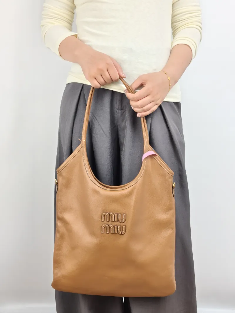 Miumiu Shoulder Bag IVY Tote Shopping Tote CC alfskin Medium 35*40 — on-model view 1 of 2