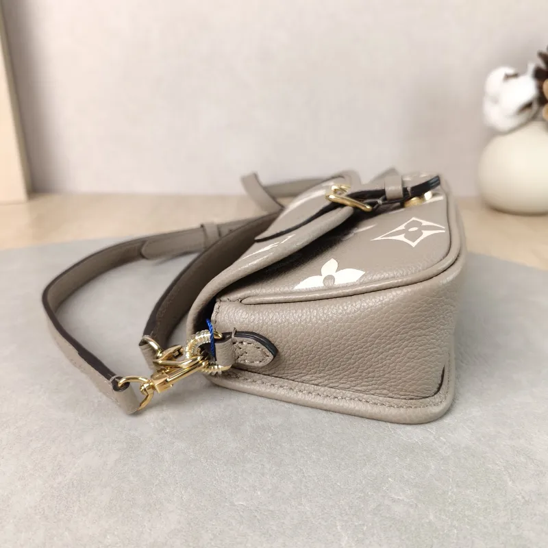 Louis Vuitton Crossbody Bag Diane Baguette Bag Empreinte Embossed Calfskin nano 19 × 6 × 10.5 cm — detail view 11 of 14