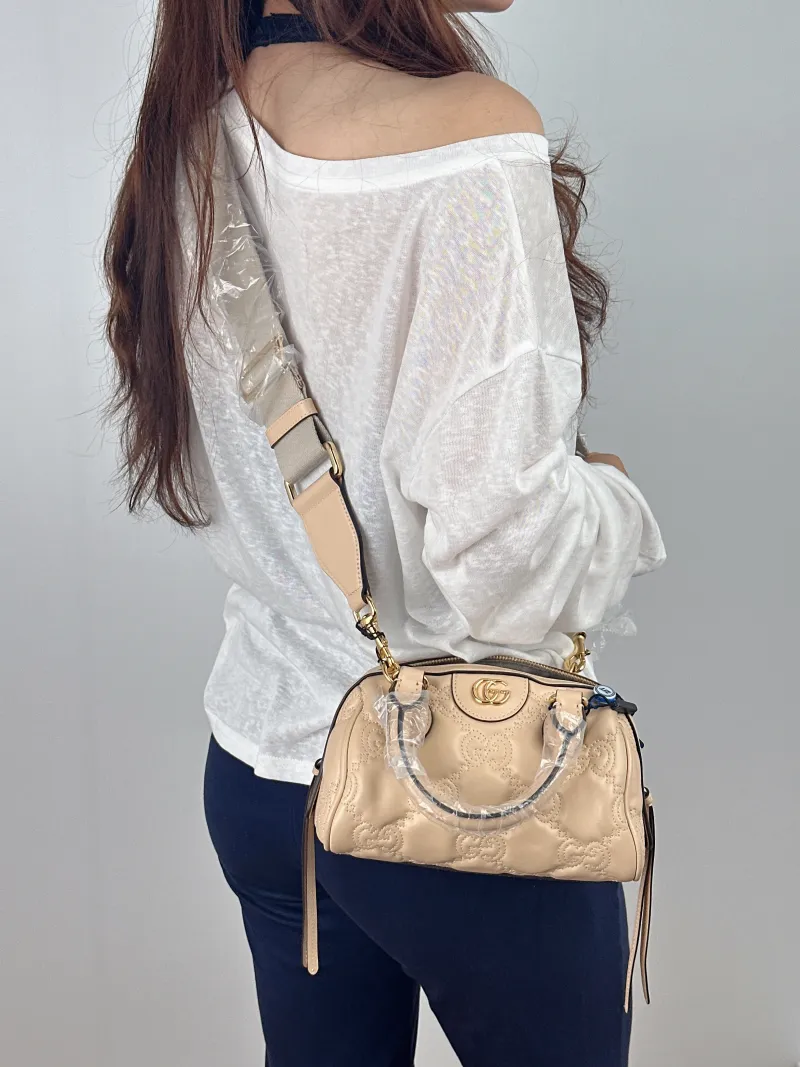 GUCCI Crossbody Bag GG matelasse Taupe Calfskin Mini 19 × 11 × 13 cm — on-model view 2 of 2