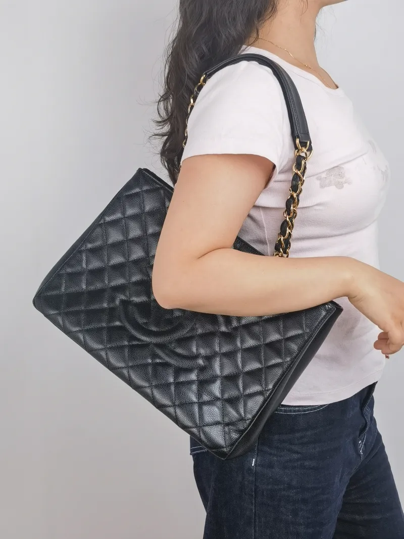 Chanel Shoulder Bag Grand Shopping Tote​ GST Shopping Tote Black Grained Calfskin Large 33 × 13 × 24 cm 15 — on-model view 1 of 2