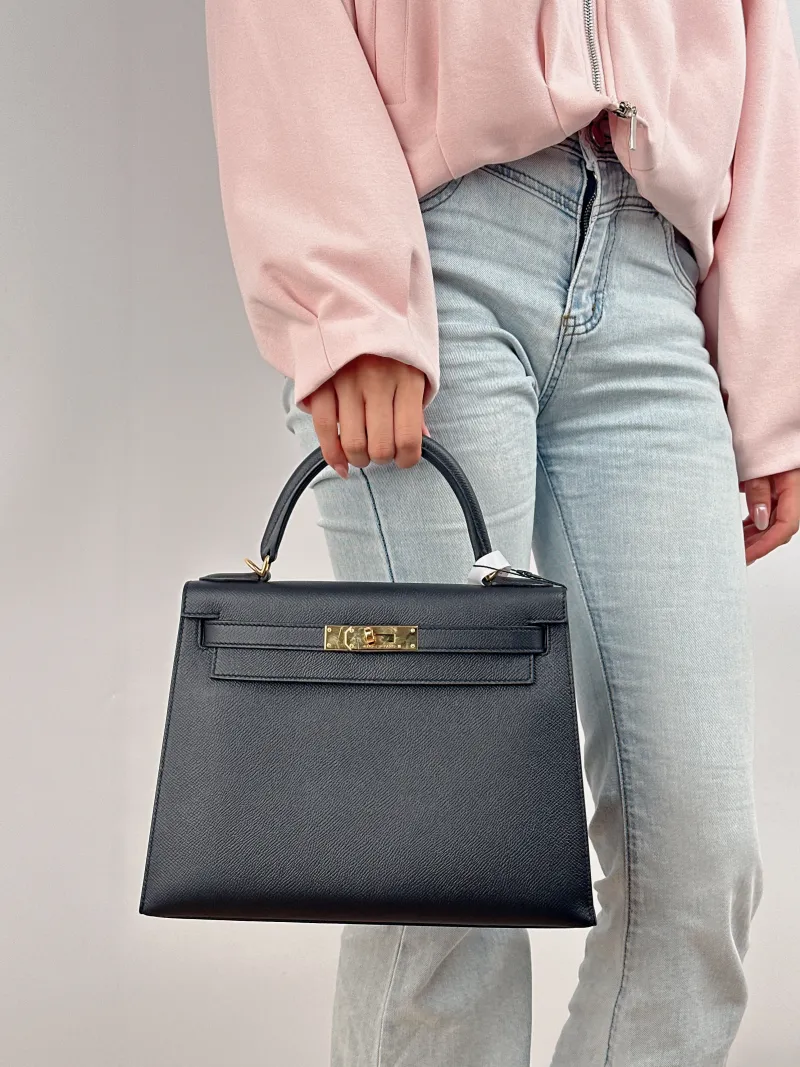 Hermès Shoulder Bag Kelly 28 Gold-Tone Hardware 89Black Epsom Calfskin Medium 28 × 10 × 22 cm C — on-model view 2 of 3