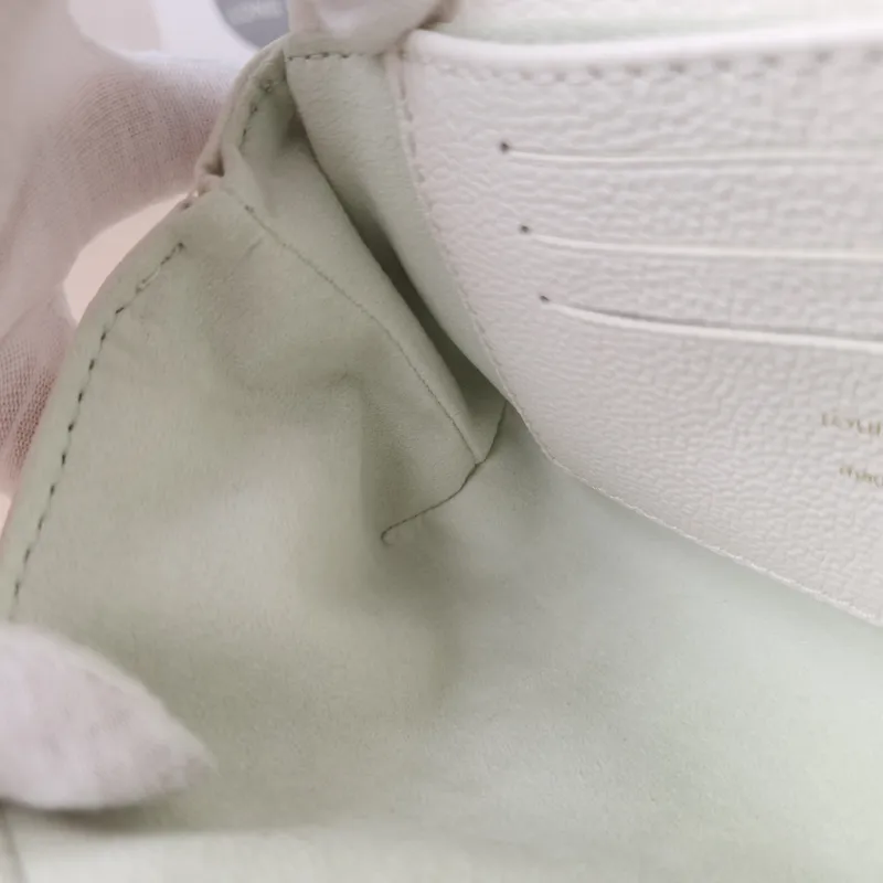 Louis Vuitton Crossbody Bag MADELEINE White · Green Calfskinnano21 × 6 × 12.5 cm — detail view 14 of 14