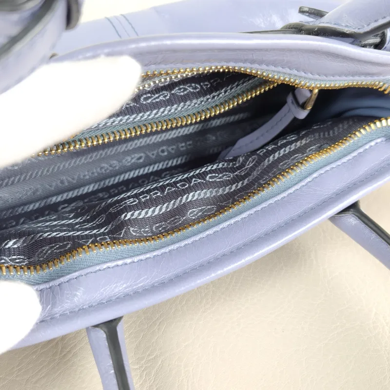 PRADA Top Handle Bag Bonnie Soft Lux Blue Waxed Leather Mini 23.5 × 9 × 12 cm — detail view 2 of 14