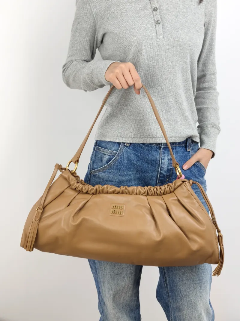 Miumiu Shoulder Bag Joie Shoulder Bag Caramel Lambskin One Size 52 × 10 × 23 cm — on-model view 1 of 2