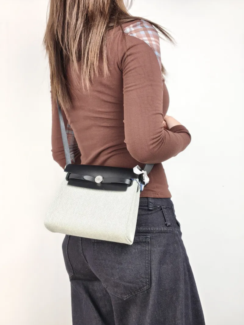 Hermès Crossbody Bag Herbag Zip 20 Beige · Green · Black Calfskin，Canvas Mini 20.5 × 7 × 16.5 cm G — on-model view 1 of 2