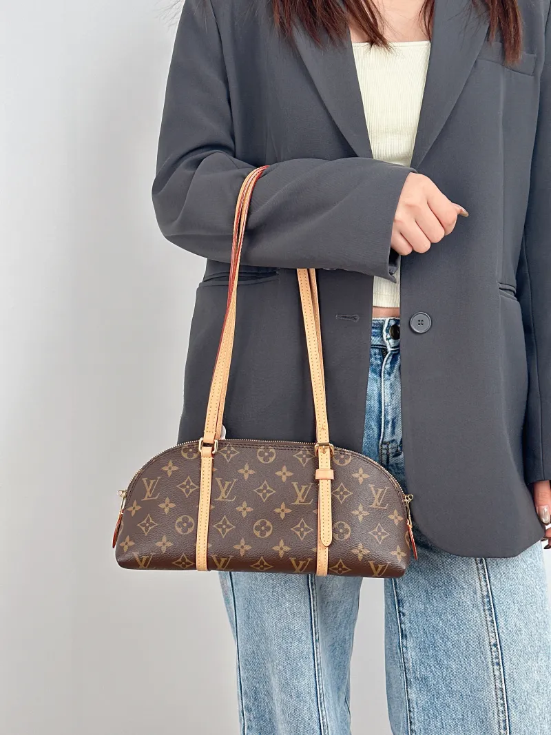 Louis Vuitton Shoulder Bag Squire East West Monogram PVC One Size 29 × 8 × 14 cm — on-model view 2 of 2