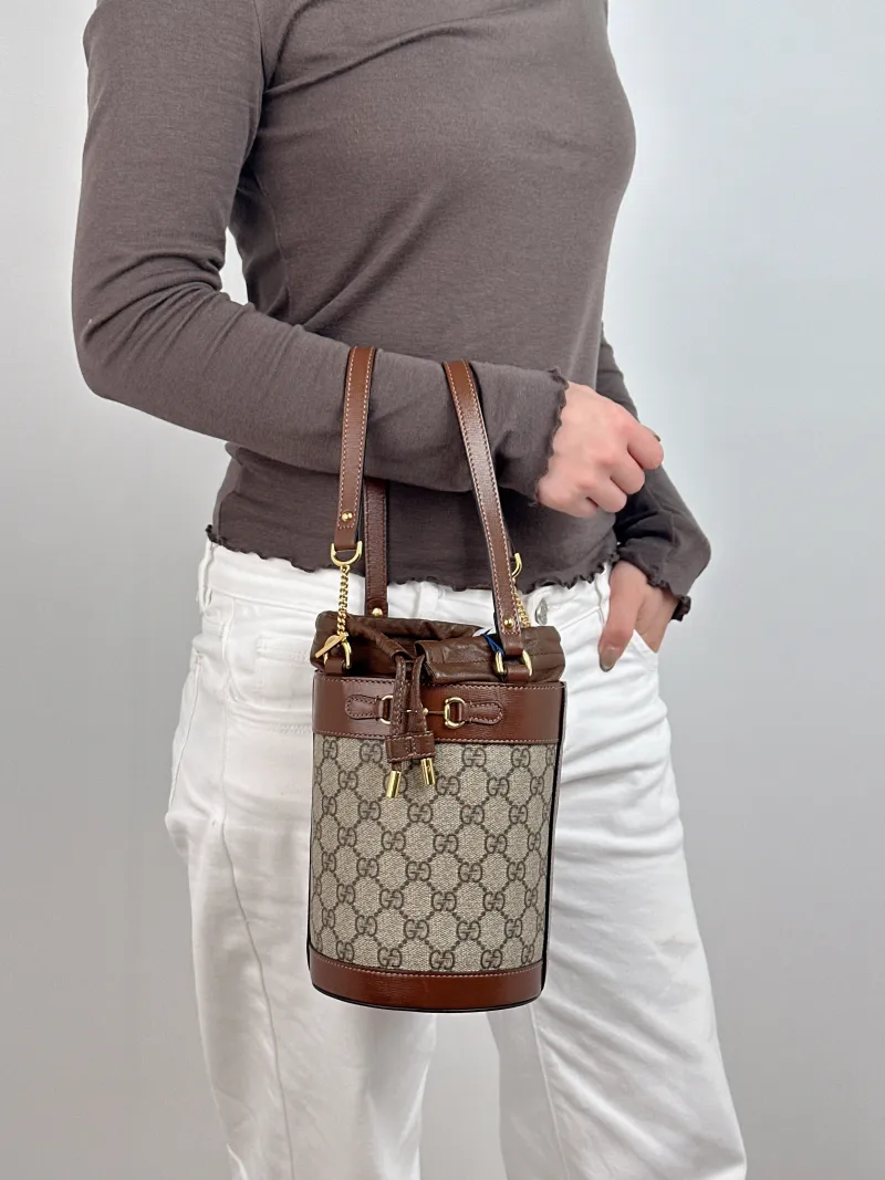 GUCCI Top Handle Bag Horsebit 1955Collection Bucket Bag White PVC Small 14 × 14 × 19 cm — on-model view 1 of 2