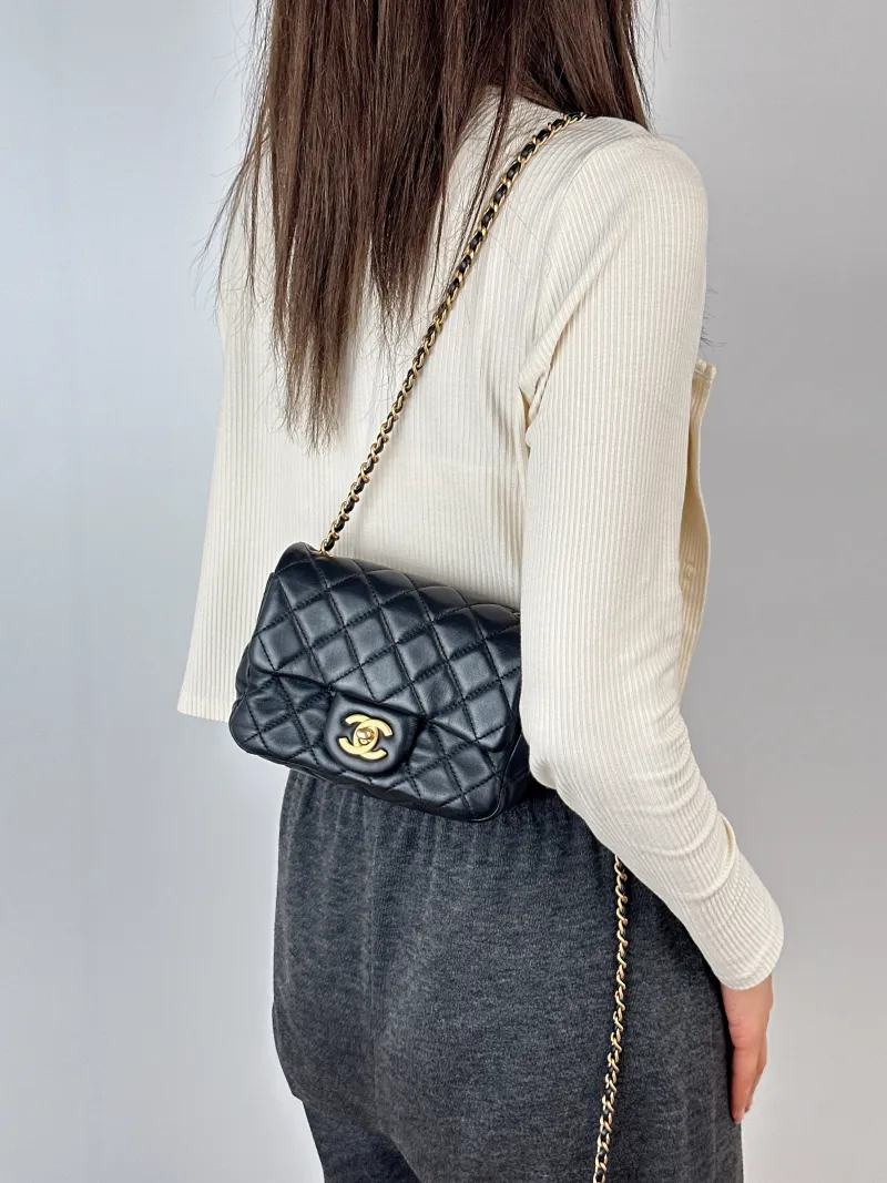 Chanel Crossbody Bag Black Lambskinmini17 × 8 × 13.5 cm — on-model view 2 of 3