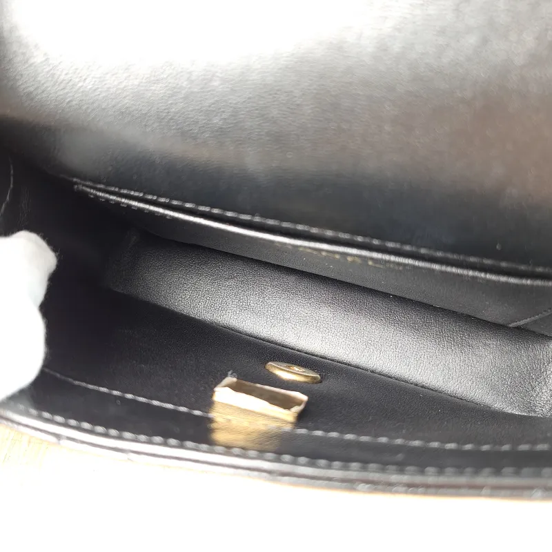 Chanel Crossbody Bag Black with Gold-Tone Hardware Lambskin Mini 18 × 5 × 12 cm — detail view 1 of 10