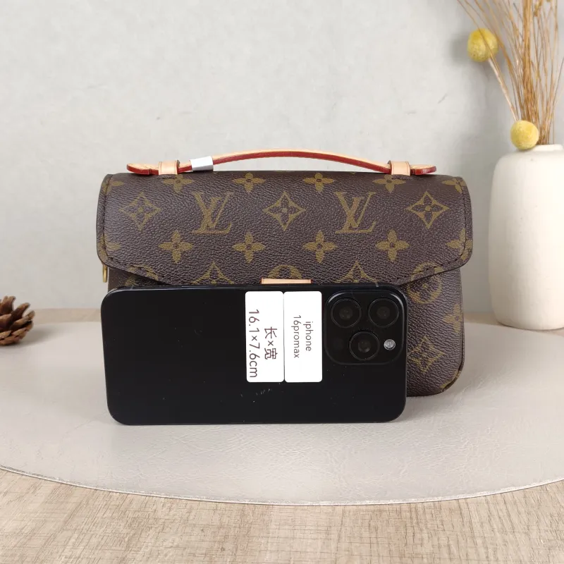 Louis Vuitton Crossbody Bag Pochette Métis East West Monogram PVC Small 21.5 × 6 × 13.5 cm — cover view 5 of 6