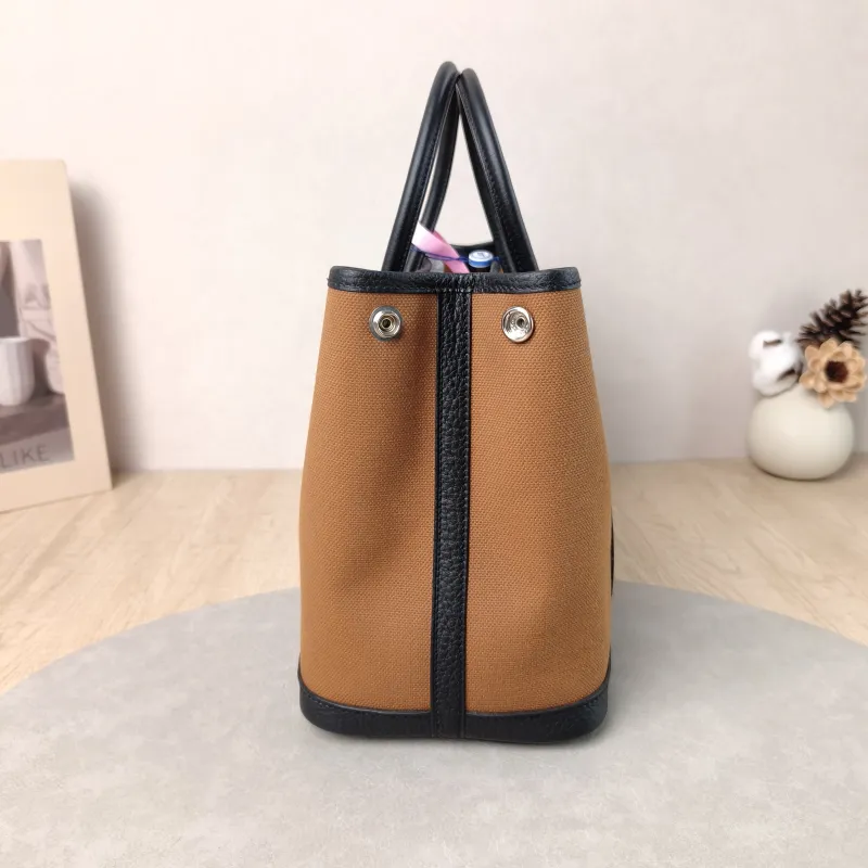Hermès Top Handle Bag Garden Party 30 30 Brown Canvas · Negonda Calfskin Medium 30 × 13 × 21 cm B — detail view 5 of 9