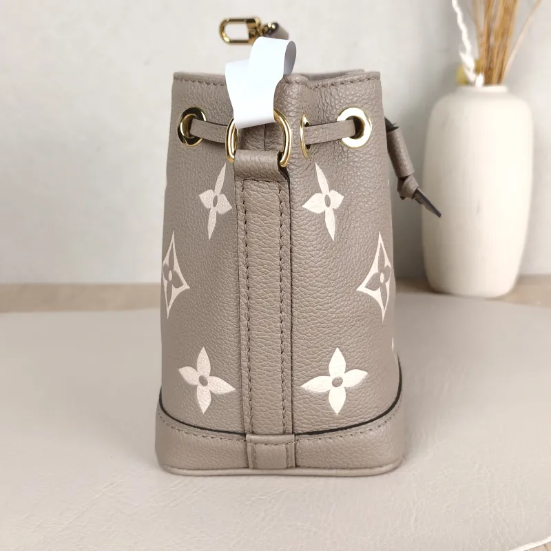 Louis Vuitton Crossbody Bag NANO NOÉ Bucket Bag Nano · White Monogram Empreinte Embossed Calfskin nano 13 × 10 × 16 cm — detail view 4 of 11