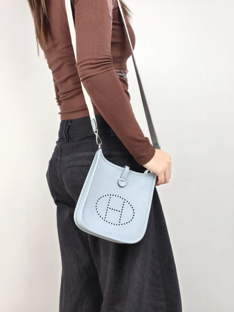 Hermès Crossbody Bag Evelyne Mini 16 Mini 16 J7 Taurillon Clemence TC Calfskin Mini 17 × 5.5 × 18 cm K — on-model view 2 of 2