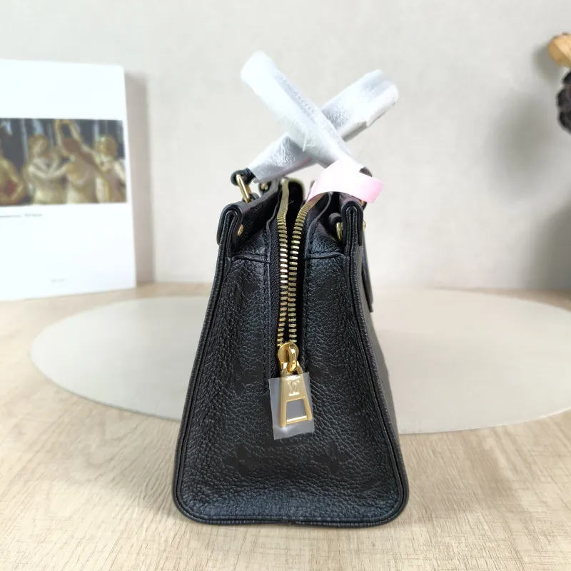 Louis Vuitton Crossbody Bag Onthego East West Two Straps Black Empreinte Embossed Calfskin Small 25 × 10 × 13 cm — detail view 12 of 12