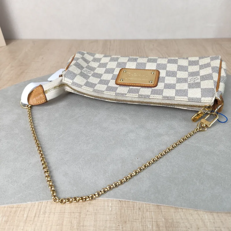 Louis Vuitton Crossbody Bag Eva PVC Small 25 × 4 × 13 cm — detail view 2 of 14