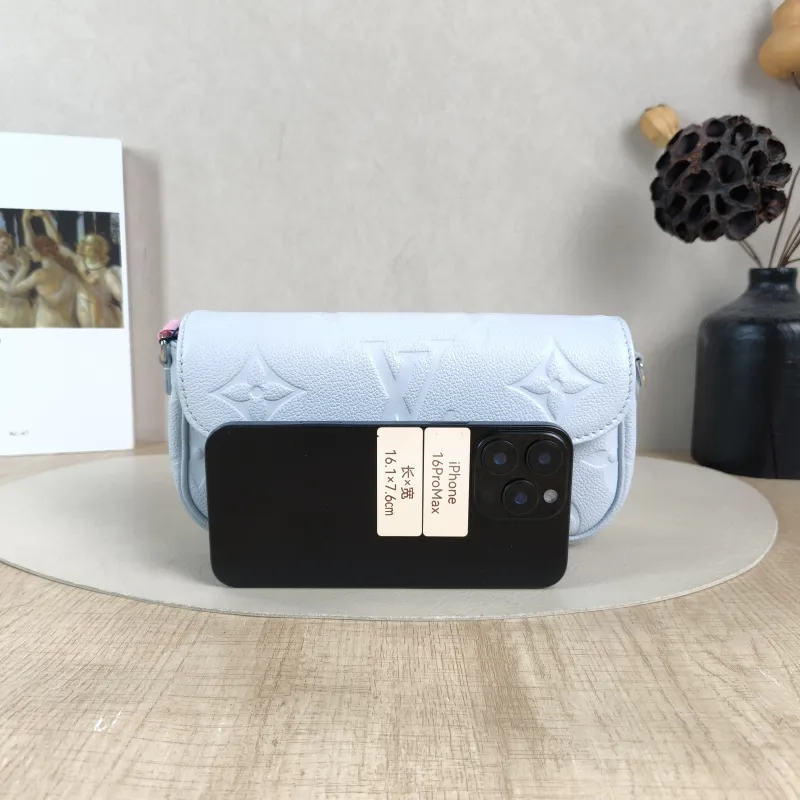 Louis Vuitton Crossbody Bag IVY Blue Empreinte Embossed Calfskin Small 23.5 × 4.3 × 12 cm — cover view 3 of 6