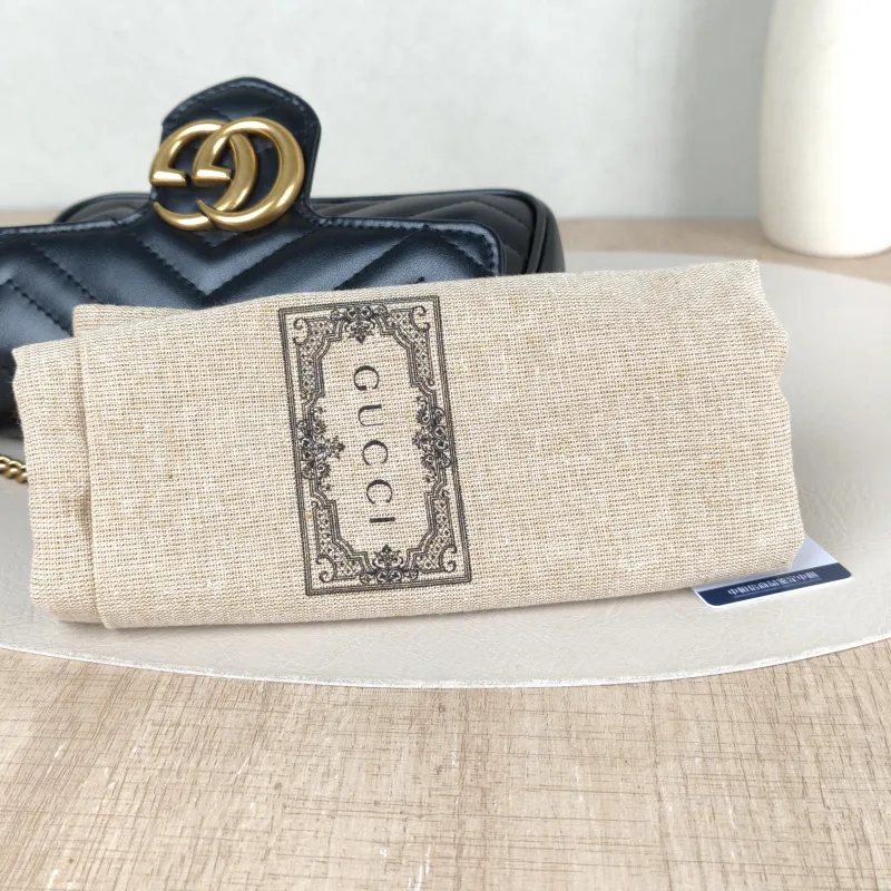 GUCCI Crossbody Bag GG Marmont Mini Marmont Mini Black with Gold-Tone Hardware Calfskinmini16.5 × 4.5 × 9.5 cm — detail view 6 of 13