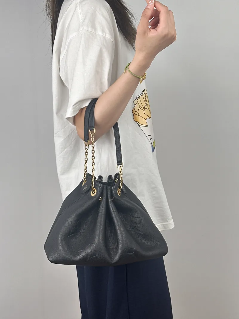 Louis Vuitton Crossbody Bag BUNDLE Black Empreinte Embossed Calfskin Monogram Medium28 × 11.5 × 20 cm — on-model view 2 of 2