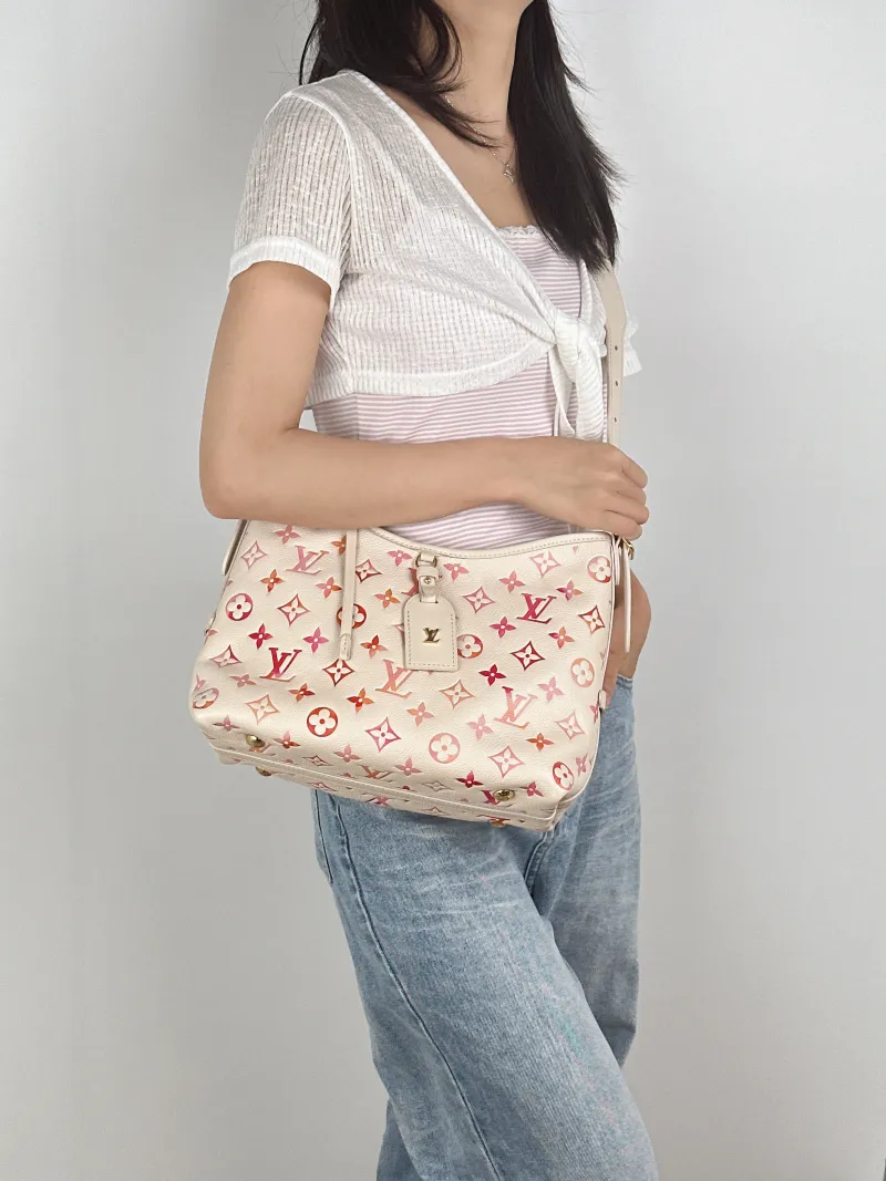 Louis Vuitton Crossbody Bag Carryall Calfskin Small29.5 × 12 × 24 cm — on-model view 1 of 2