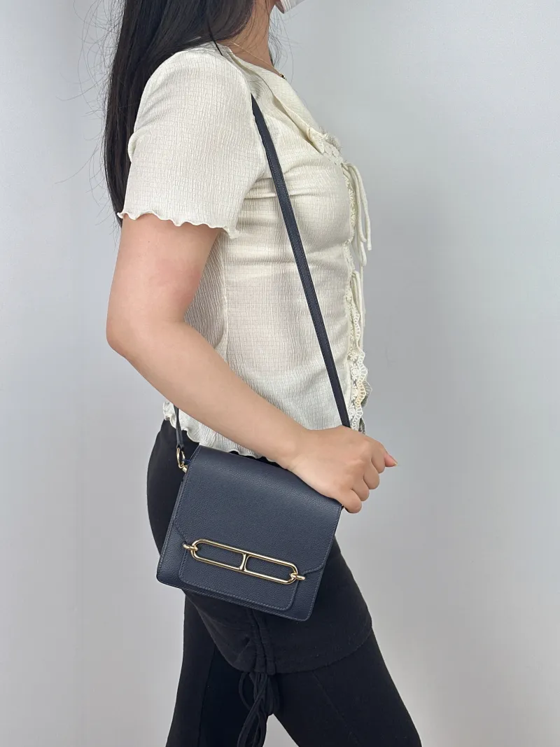 Hermès Crossbody Bag Roulis 19 Evercolor Calfskinmini18 × 6 × 15 cm — on-model view 2 of 2