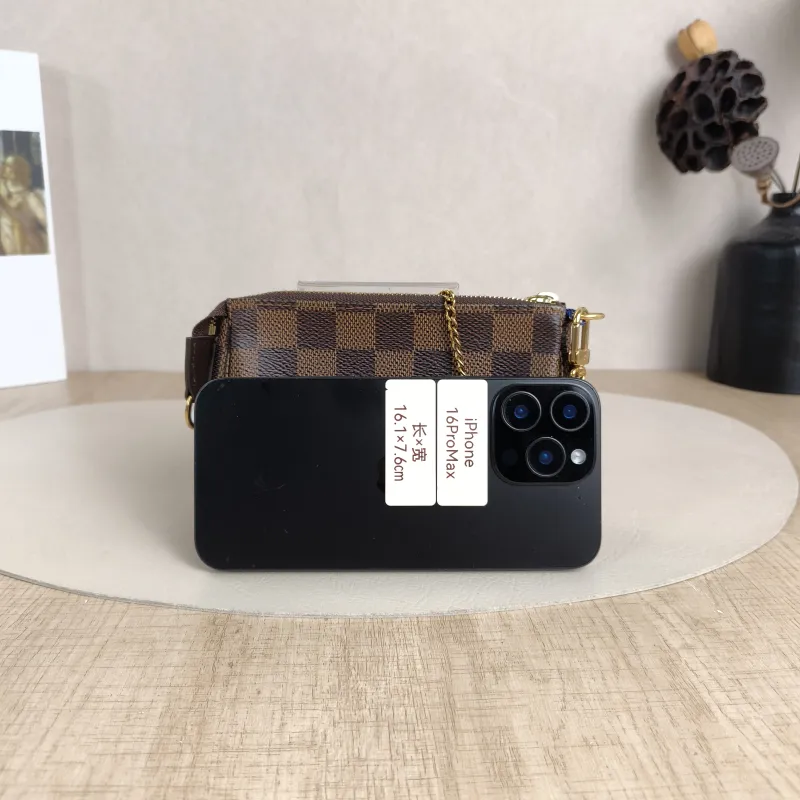 Louis Vuitton Clutch Mini Pochette Accessoires PV Cmini15.5 × 4 × 10.5 cm — cover view 2 of 5