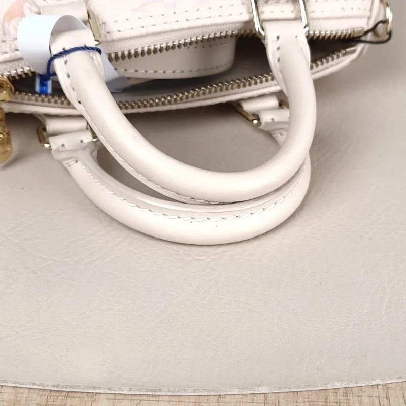 Louis Vuitton Crossbody Bag Speedy Nano Monogram Empreinte Embossed Calfskin nano 16 × 7.5 × 10 cm — detail view 9 of 11