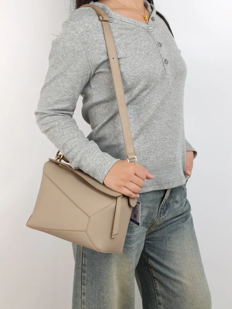 LOEWE Crossbody Bag Puzzle CC alfskin Small 24 × 10.5 × 16.5 cm — on-model view 3 of 3