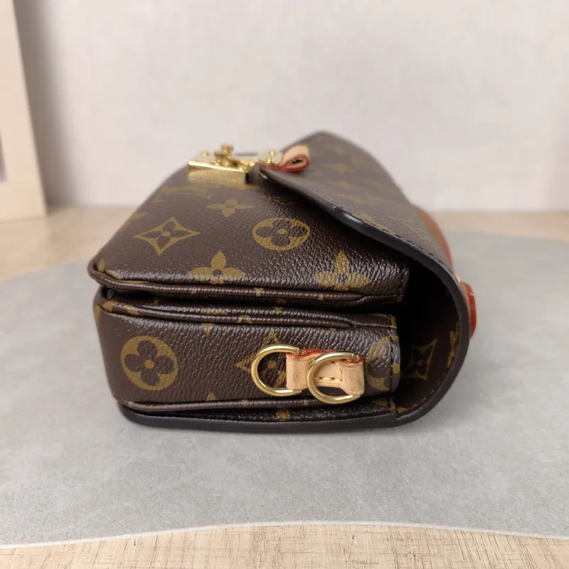 Louis Vuitton Crossbody Bag Pochette Métis East West Monogram PVC Small 21.5 × 6 × 13.5 cm — detail view 1 of 13