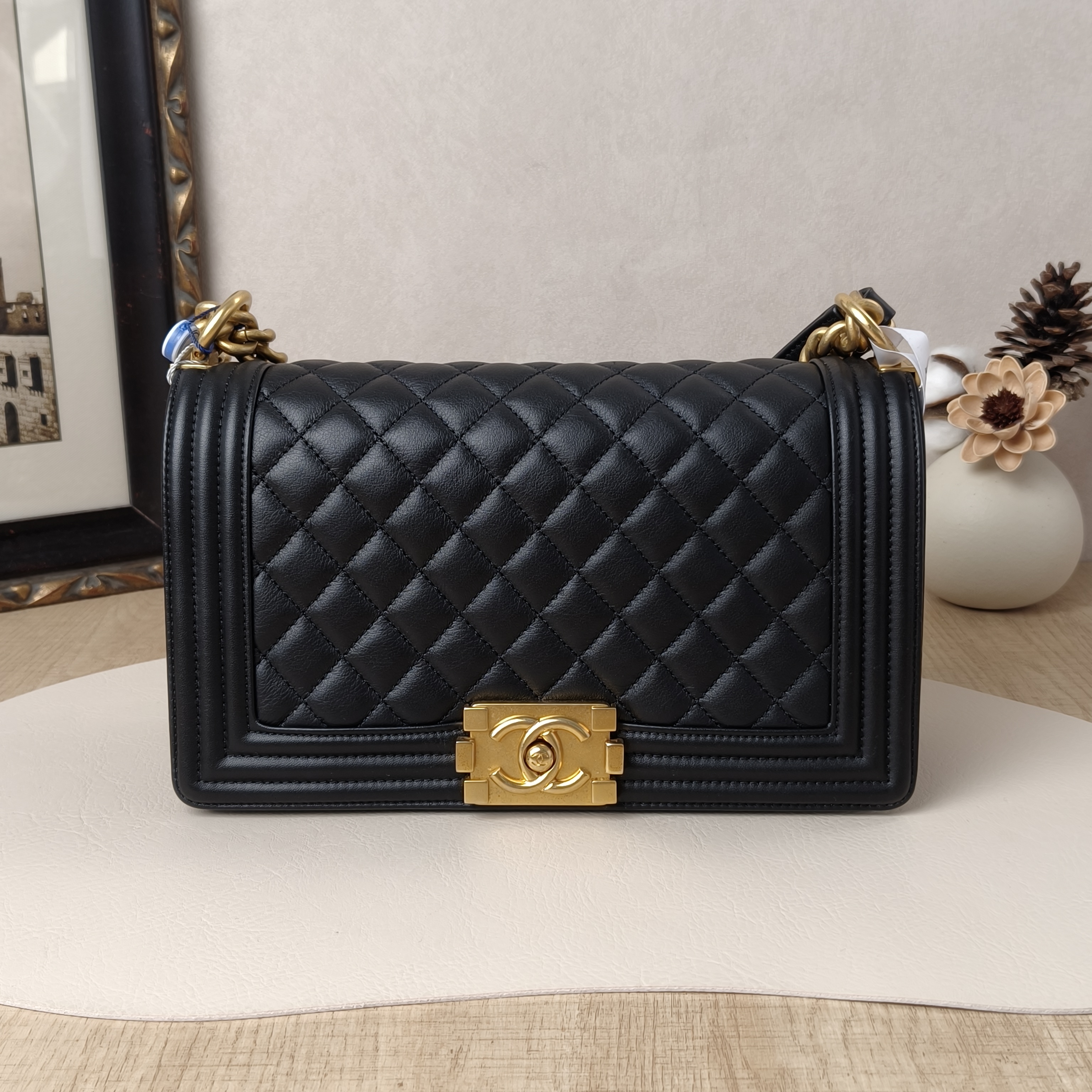 Chanel leboy Medium Black with Gold-Tone Hardware Calfskin Microchip Edition · 25 × 9 × 15 cm