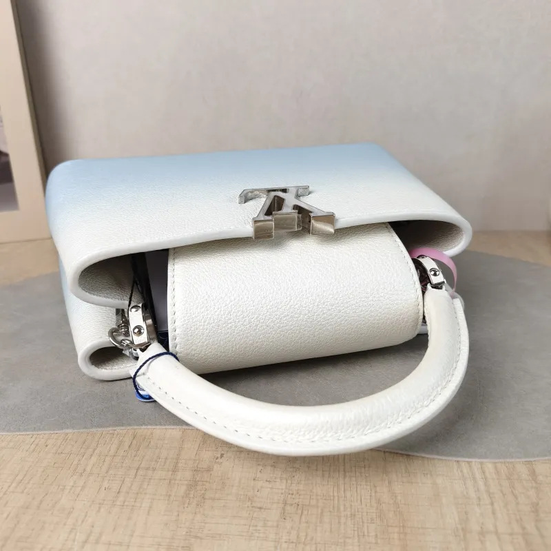 Louis Vuitton Top Handle Bag Capucines Calfskin BB 27 × 9 × 17.5 cm — detail view 1 of 15