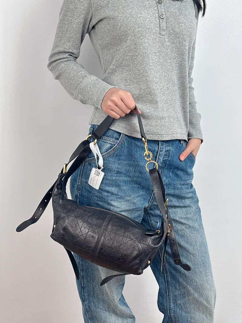 DIOR Shoulder Bag D-Journey Shoulder Bag Hobo Black Calfskin Small 25.5 × 14 × 14.5 cm — on-model view 1 of 2