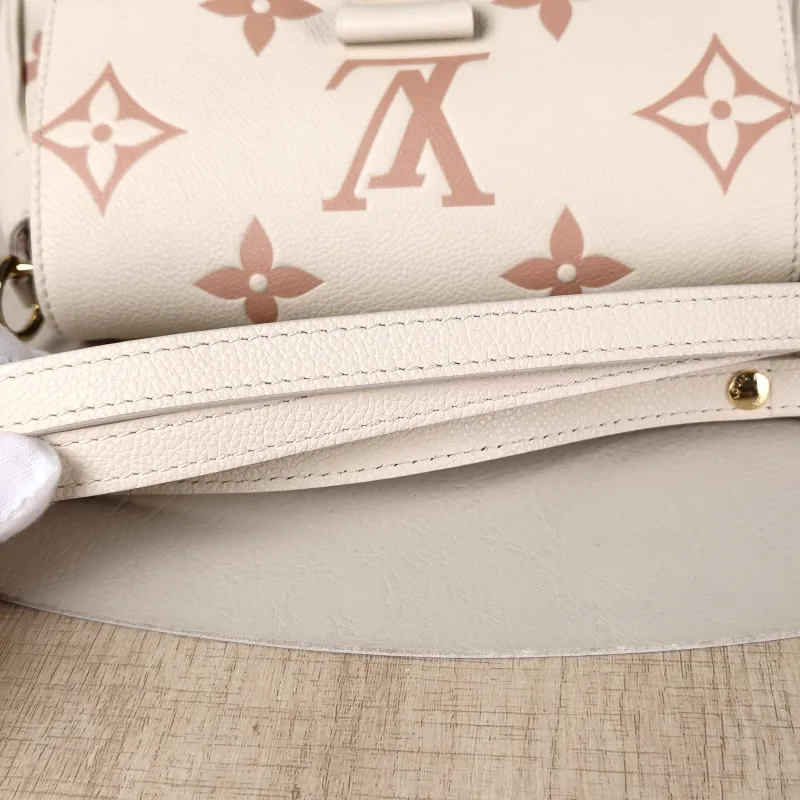 Louis Vuitton Crossbody Bag Favorite White · Pink Empreinte Embossed Calfskin Monogram Medium24 × 9 × 14 cm — detail view 8 of 12