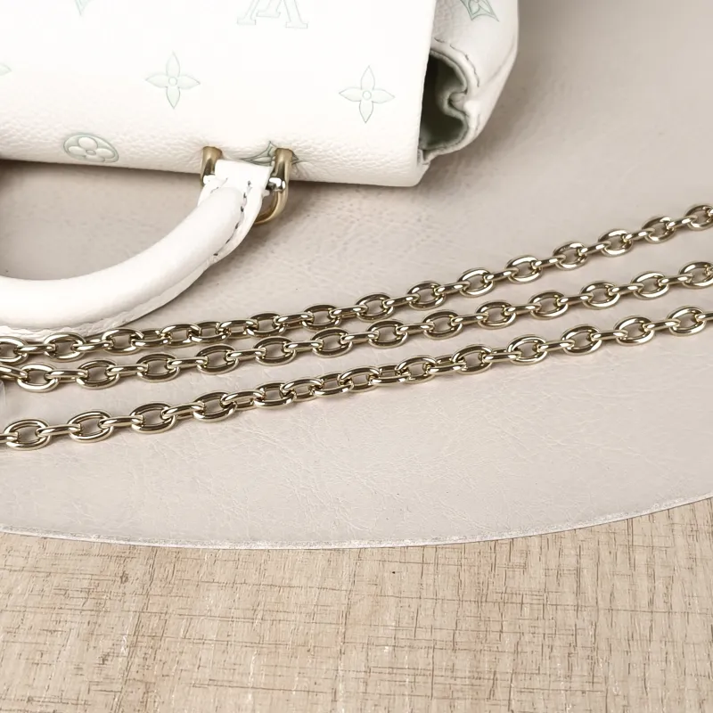 Louis Vuitton Crossbody Bag MADELEINE White · Green Calfskin nano 21 × 6 × 12.5 cm — detail view 2 of 11
