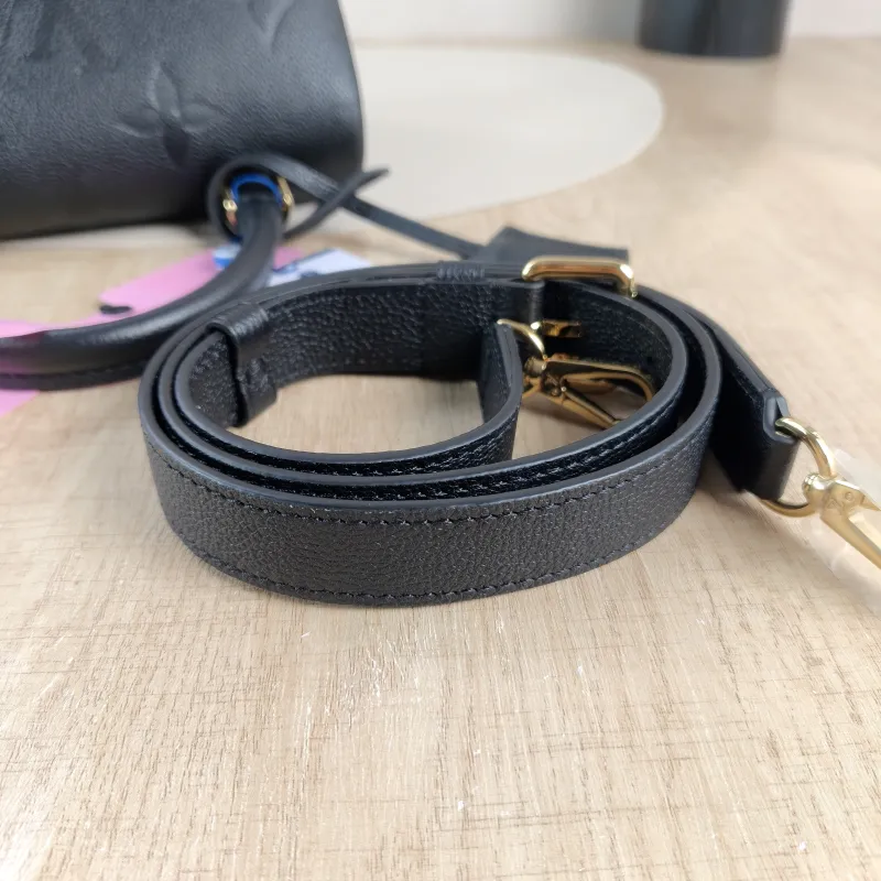 Louis Vuitton Crossbody Bag MADELEINE Black Empreinte Embossed Calfskin BB 24 × 8.5 × 17 cm — detail view 14 of 15
