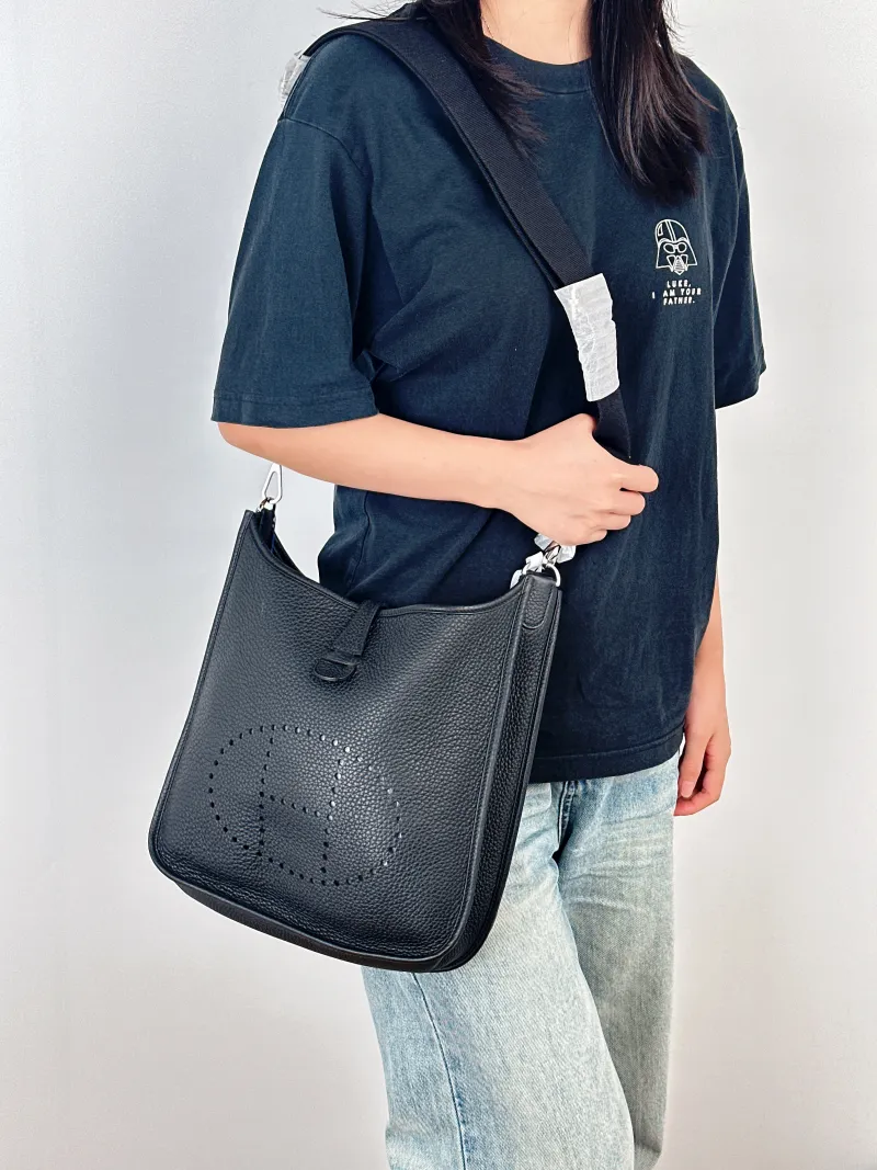 Hermès Crossbody Bag Evelyne 29 29Black Clemence Taurillon TC Calfskin Small29 × 8 × 30 cm — on-model view 1 of 2