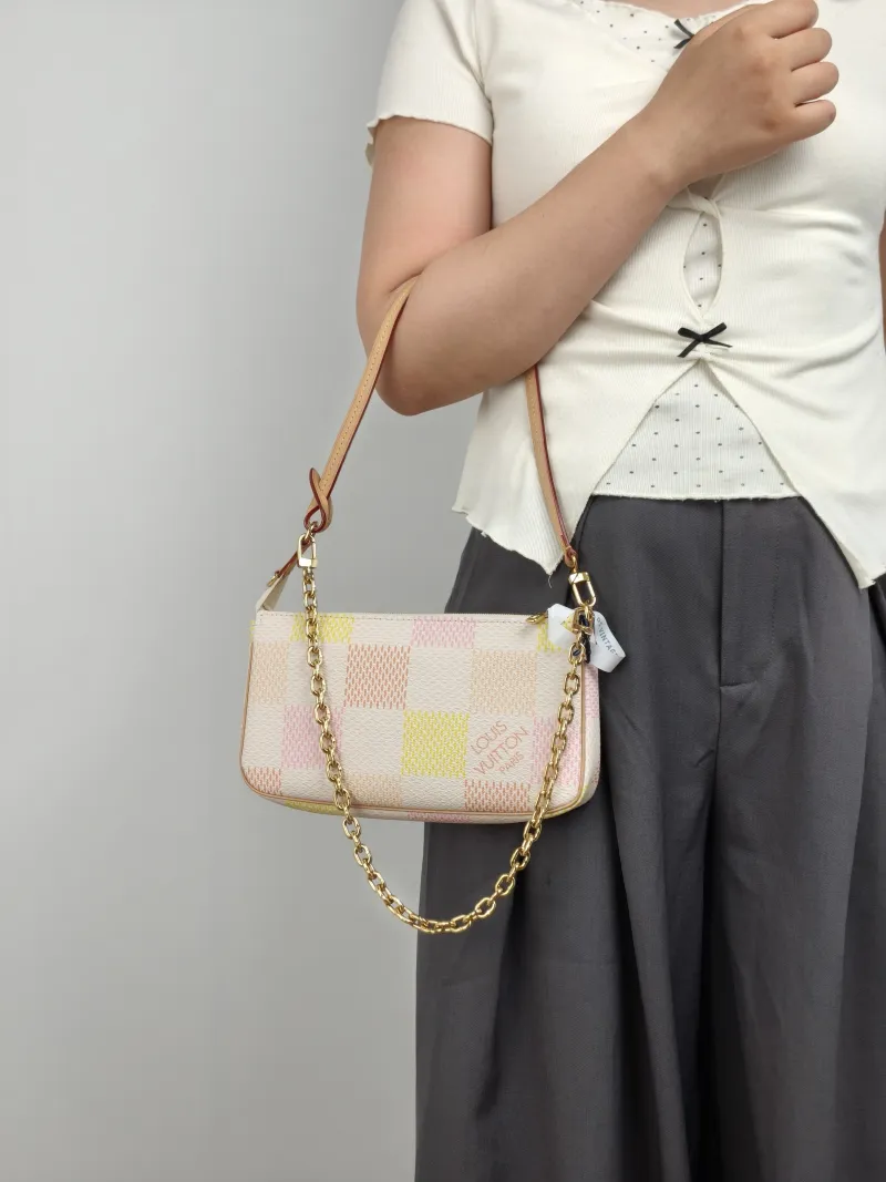 Louis Vuitton Shoulder Bag Pochette Accessoires PVC Large 23.5 × 4 × 13.5 cm — on-model view 1 of 2