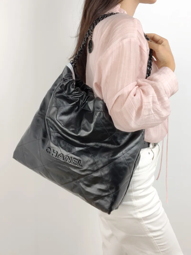 Chanel Shoulder Bag 22Bag Black CC alfskin Medium 39 × 8 × 42 cm — on-model view 2 of 2
