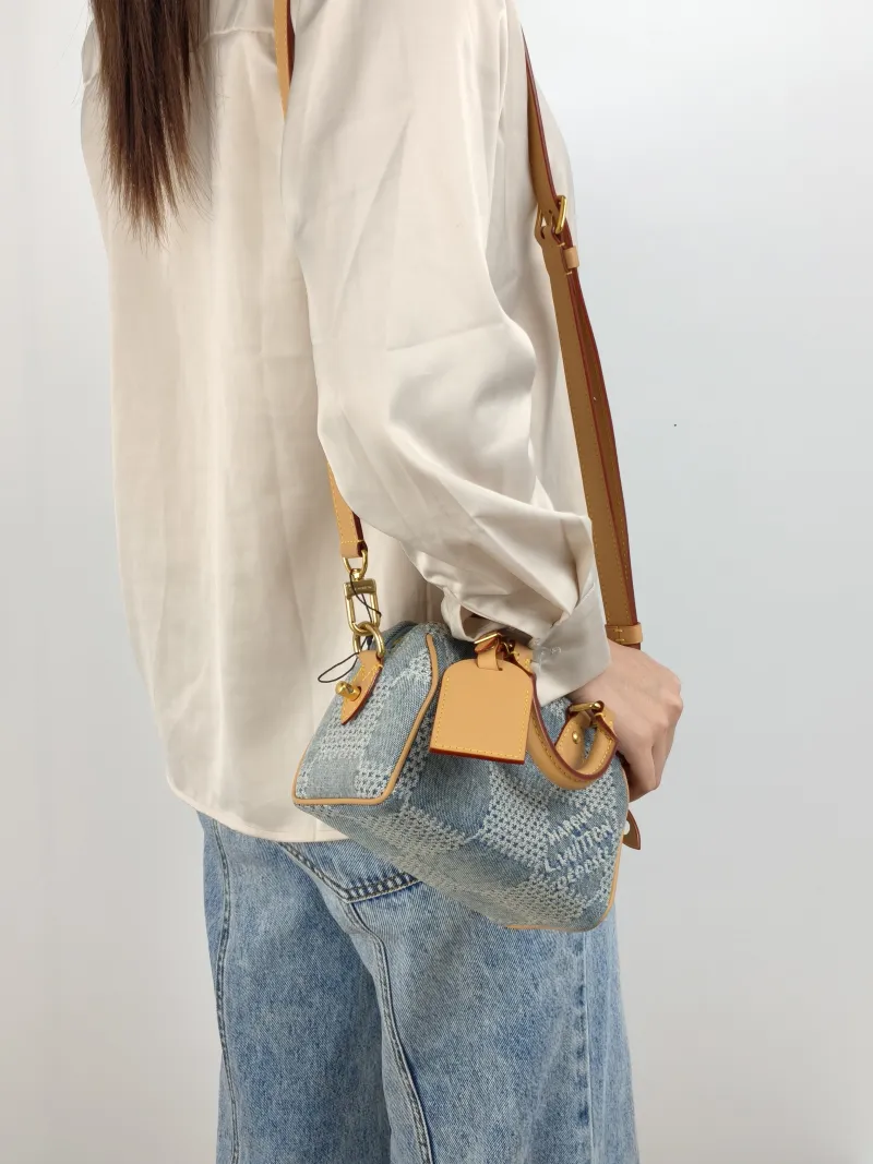 Louis Vuitton Crossbody Bag Speedy Nano Blue nano 16 × 7.5 × 10 cm — on-model view 1 of 3