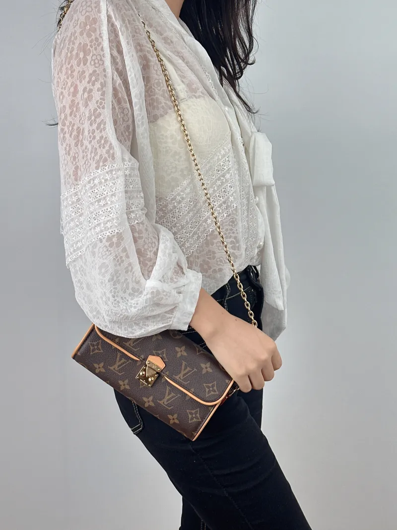 Louis Vuitton Crossbody Bag POCHETTE CAMILLE Monogram PVC One Size 20.5 × 6 × 11 cm — on-model view 2 of 2